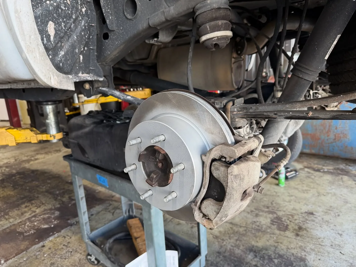 A hub and rotor on a truck in for brakes