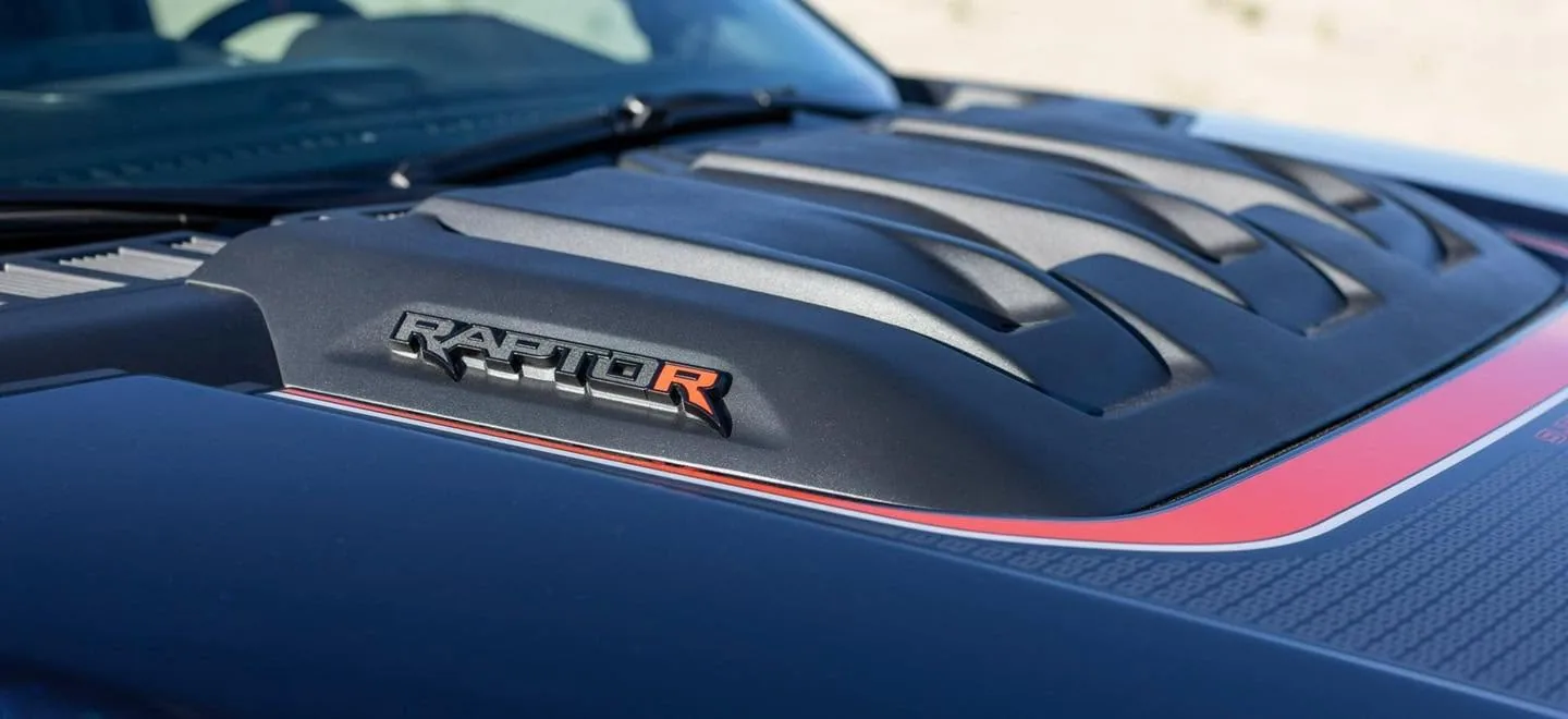 The hood of a Raptor R in the shop